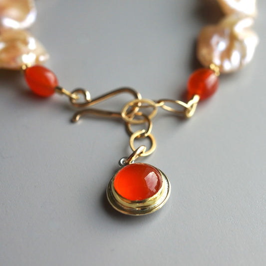 Natural keshi pearl and carnelian charm bracelet