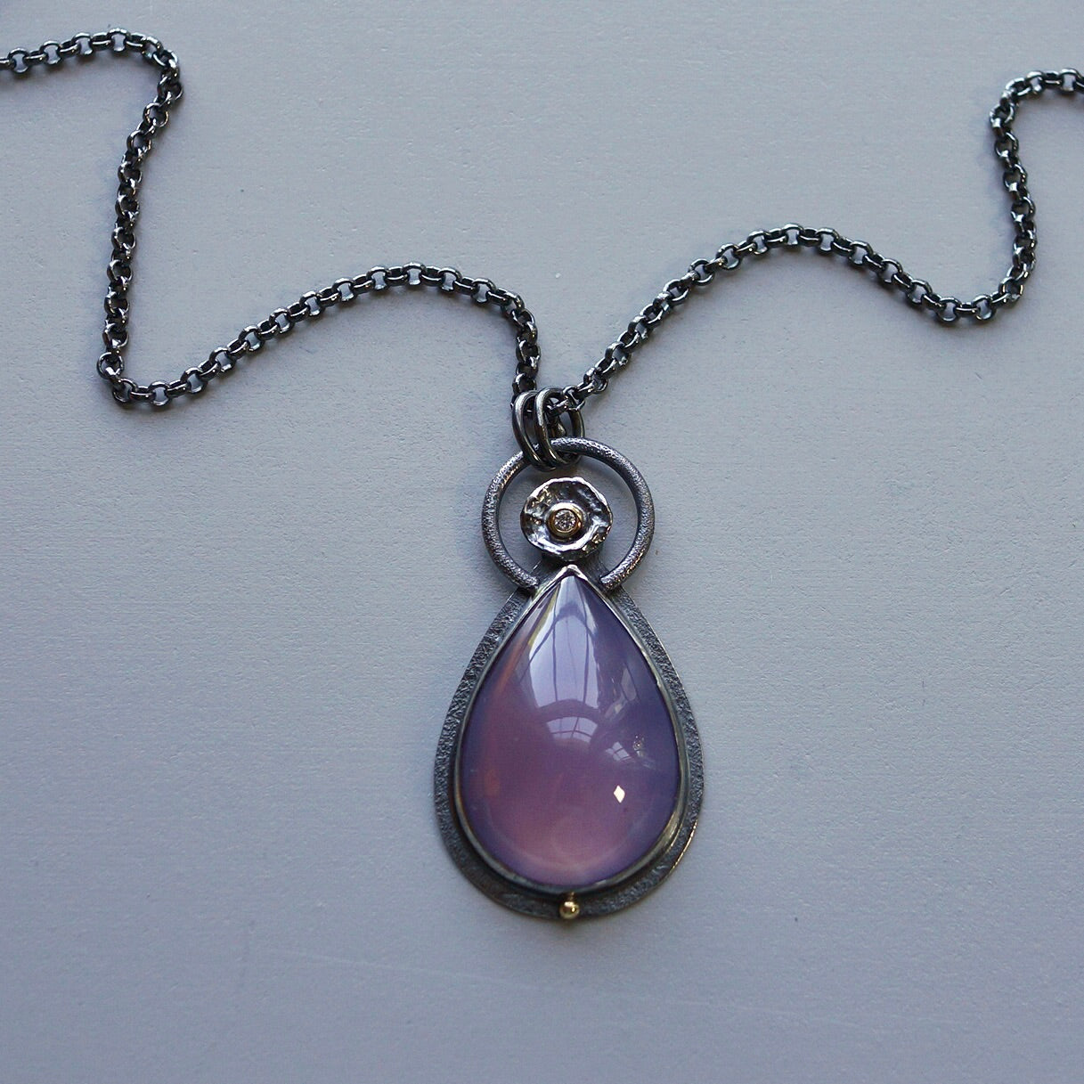 Lavender chalcedony and diamond pendant
