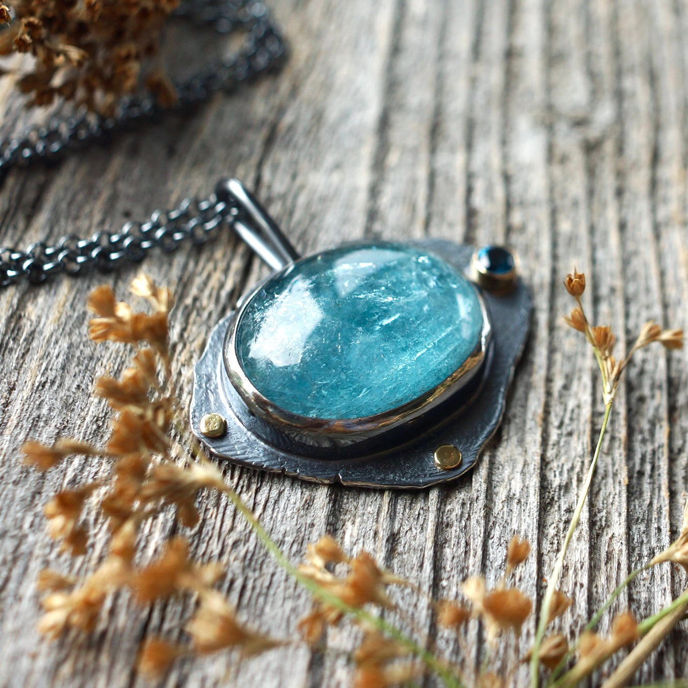 Raw blue tourmaline pendant