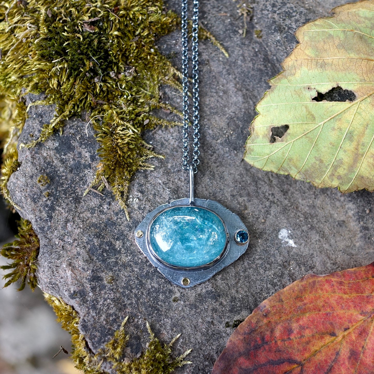 Raw blue tourmaline pendant