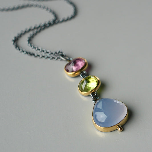 Tourmaline, sphene and blue chalcedony pendant