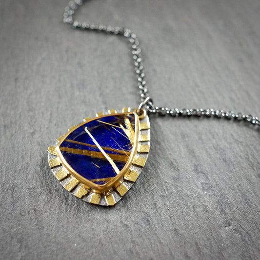 Rutilated quartz and lapis doublet pendant