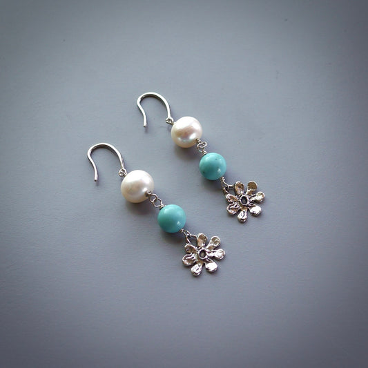 Turquoise and pearl earrings with silver flowers