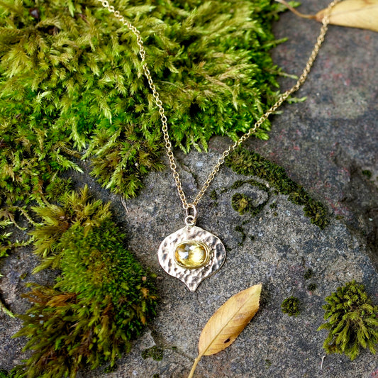 Solid gold green sphene pendant