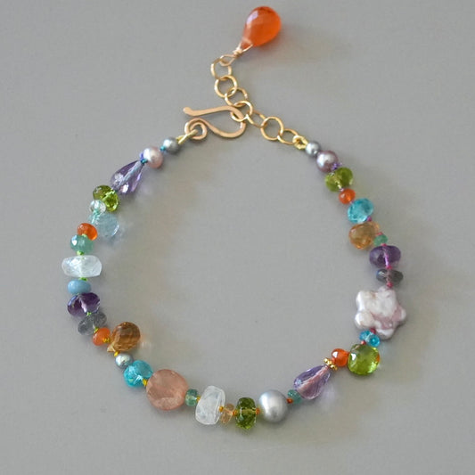 Vibrant gemstone mix silk-knotted bracelet with pearl flower