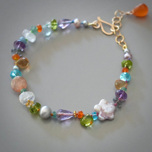 Vibrant gemstone mix silk-knotted bracelet with pearl flower