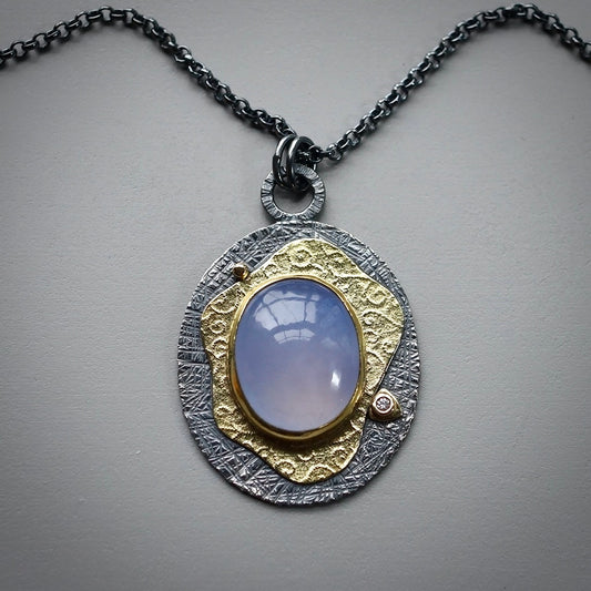 Blue chalcedony and diamond pendant