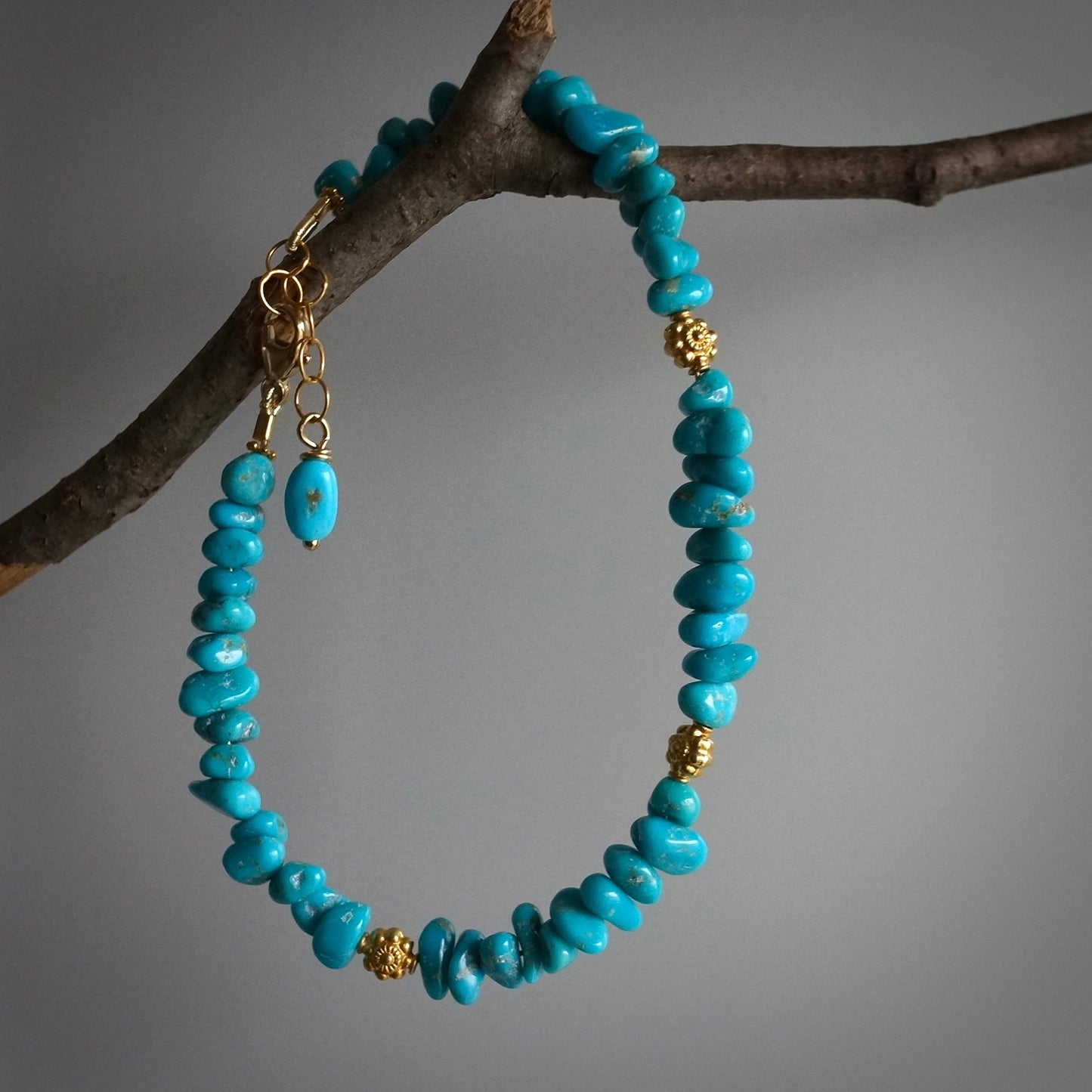 Sleeping Beauty turquoise nugget and 18K gold bracelet