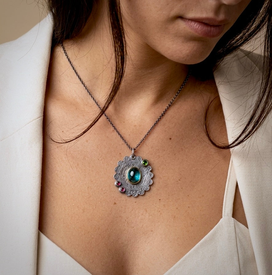 Teal blue kyanite pendant with colorful accents