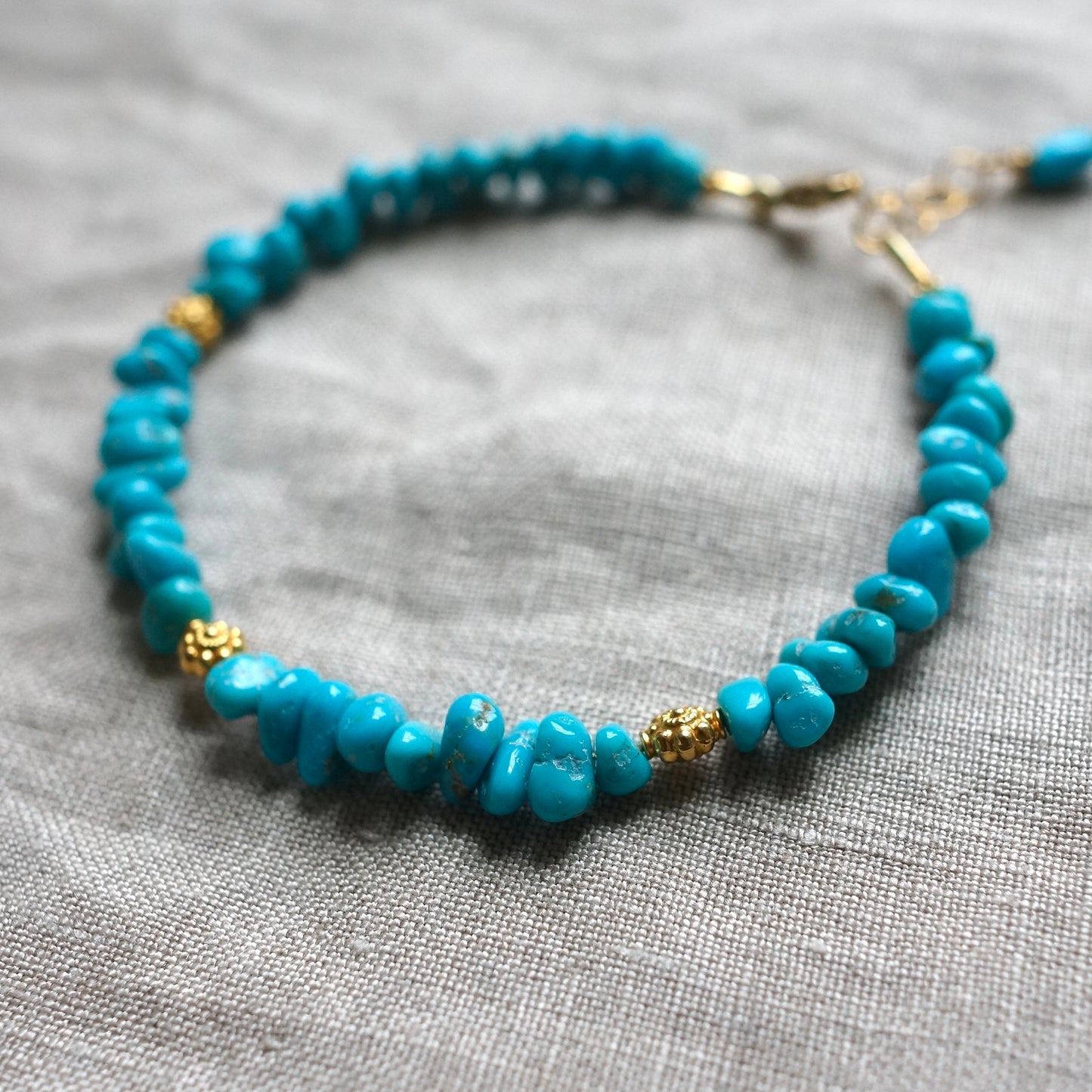 Sleeping Beauty turquoise nugget and 18K gold bracelet