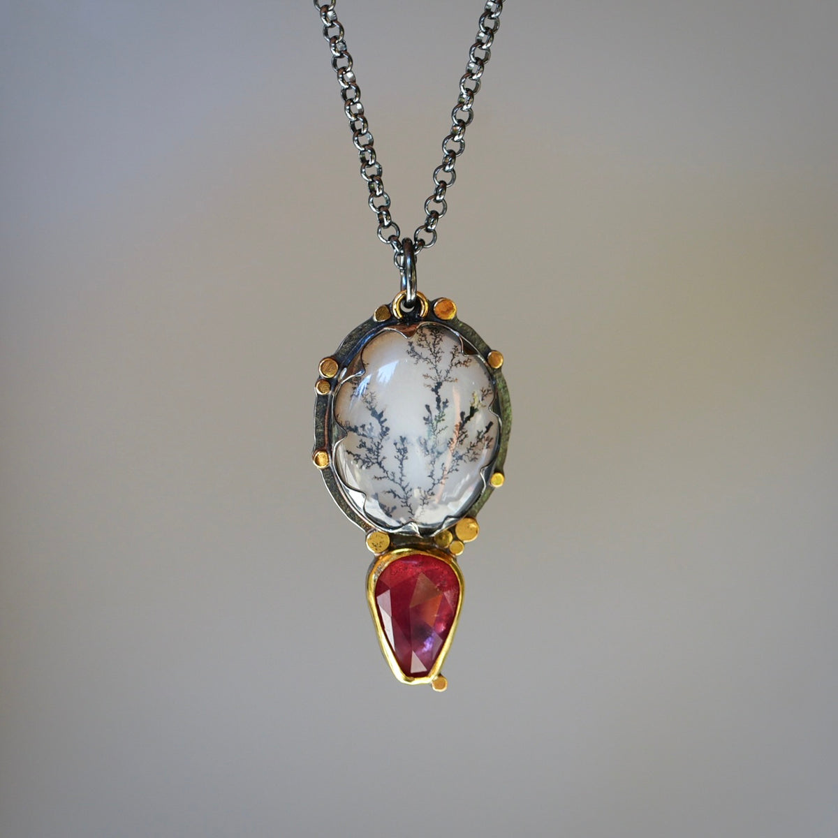 Dendritic agate and orange sapphire pendant