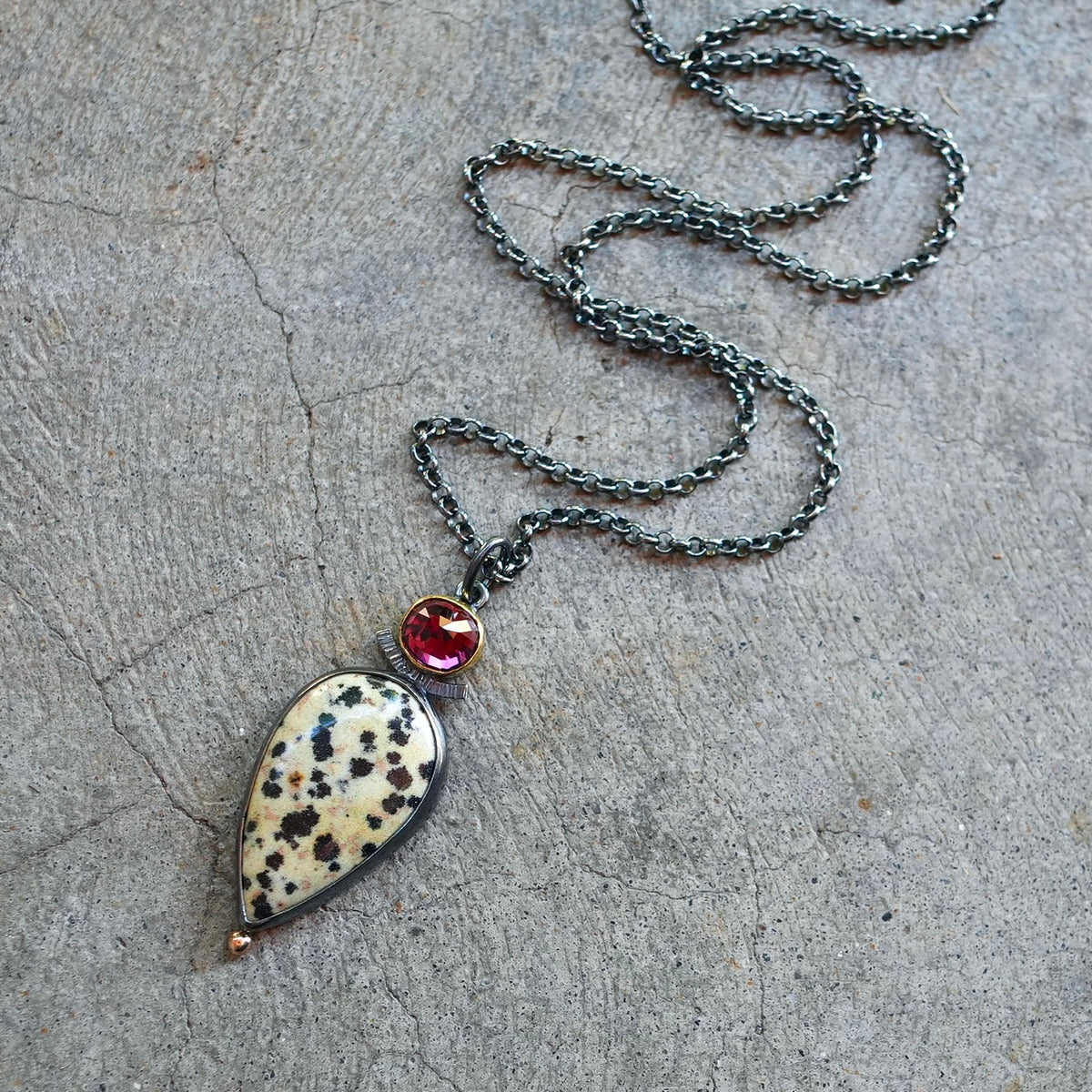 Dalmatian jasper and rhodolite garnet pendant