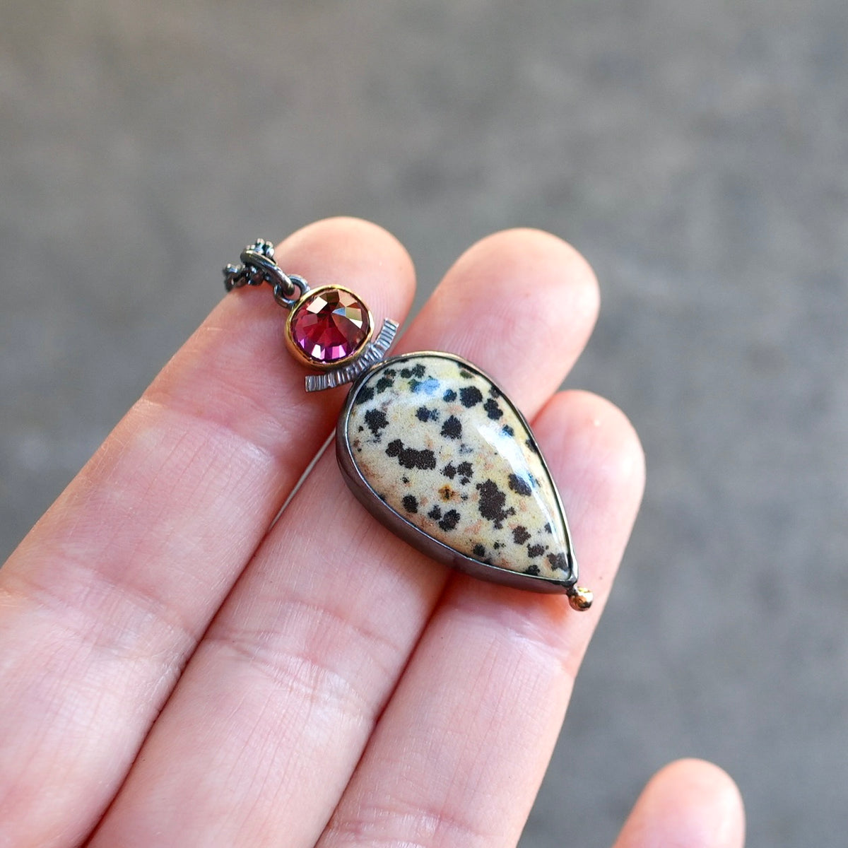 Dalmatian jasper and rhodolite garnet pendant