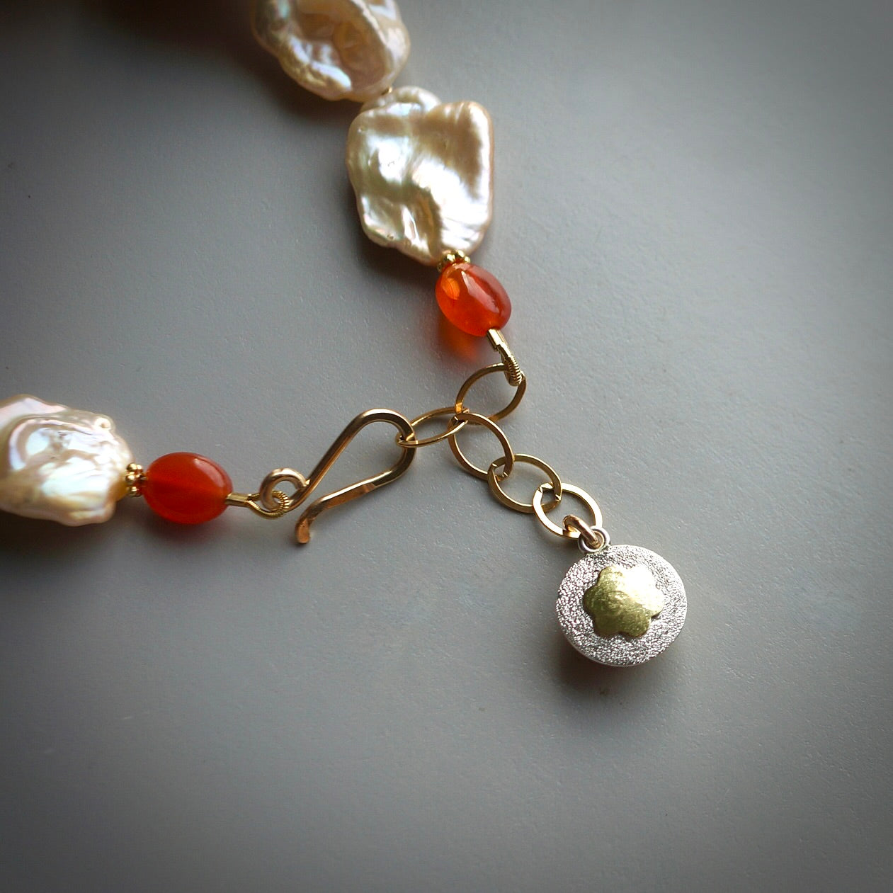 Natural keshi pearl and carnelian charm bracelet