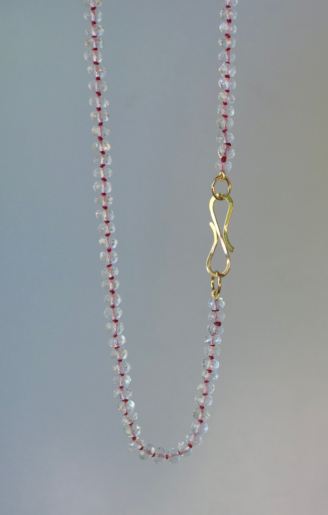 20” White Topaz necklace hand-knotted with red silk