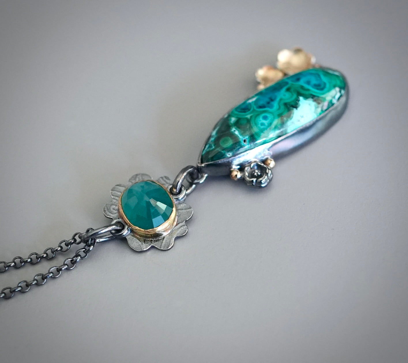 Grandidierite and malachite-chrysocolla flowering pendant