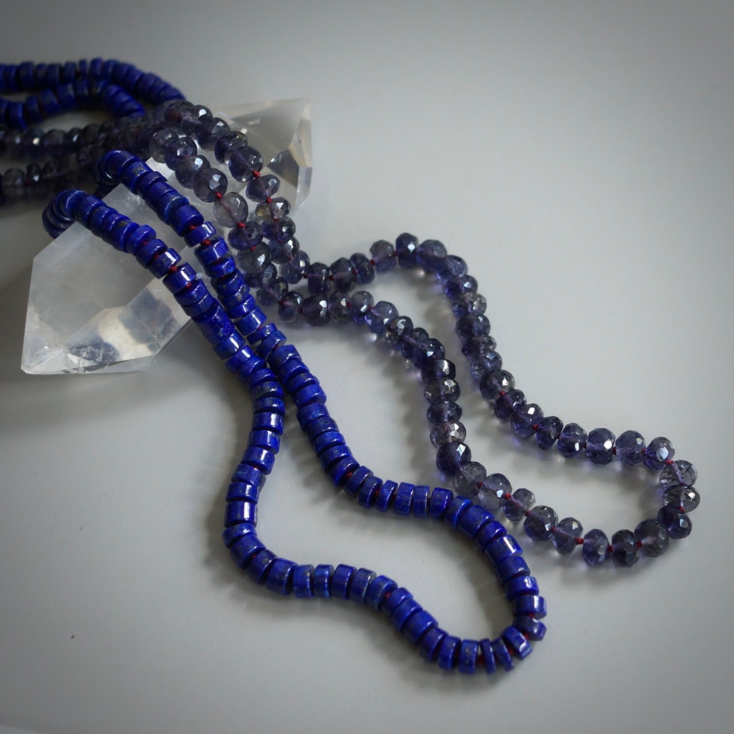 Knotted Iolite and garnet necklace