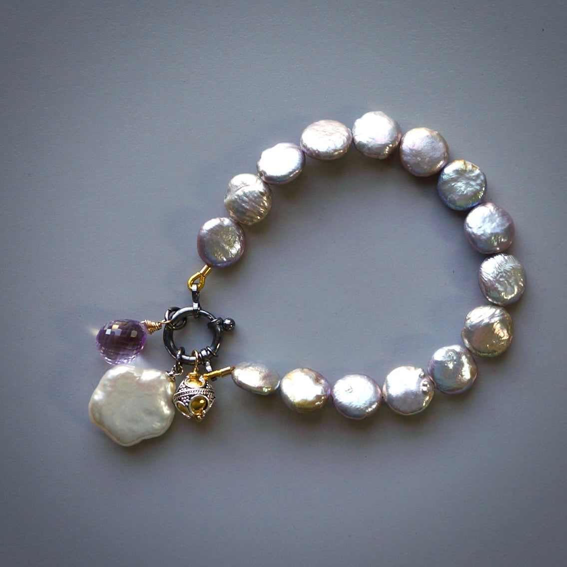 Grey-lavender pearl, pink amethyst and flower pearl charm bracelet