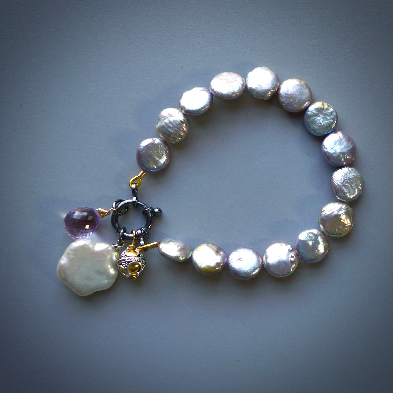 Grey-lavender pearl, pink amethyst and flower pearl charm bracelet