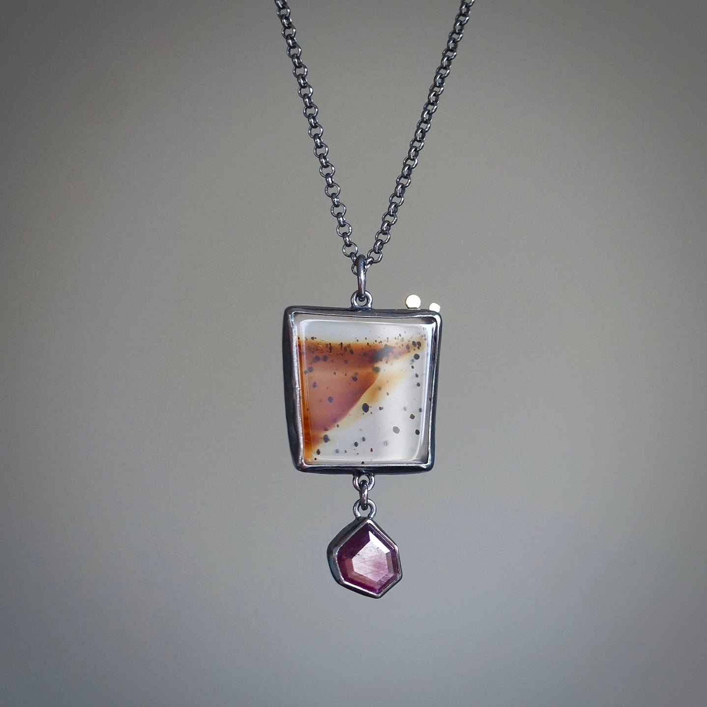 Montana agate and purple sapphire pendant -