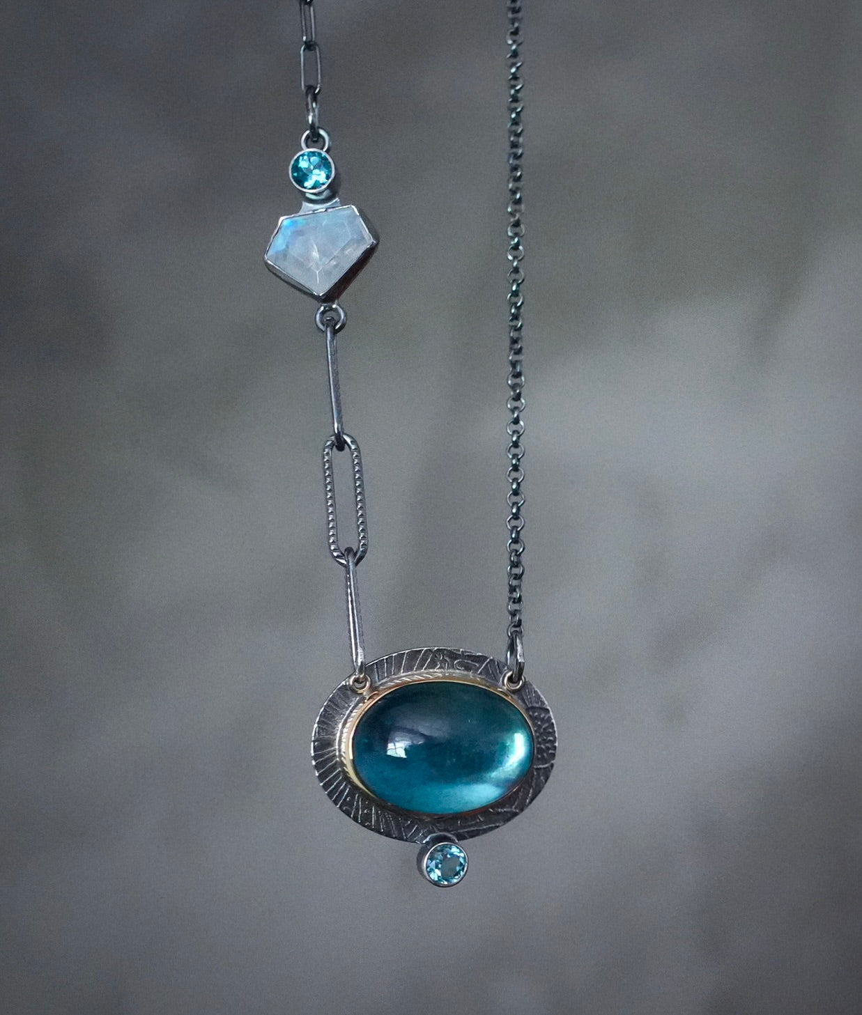 Aquamarine, blue topaz and rainbow moonstone necklace