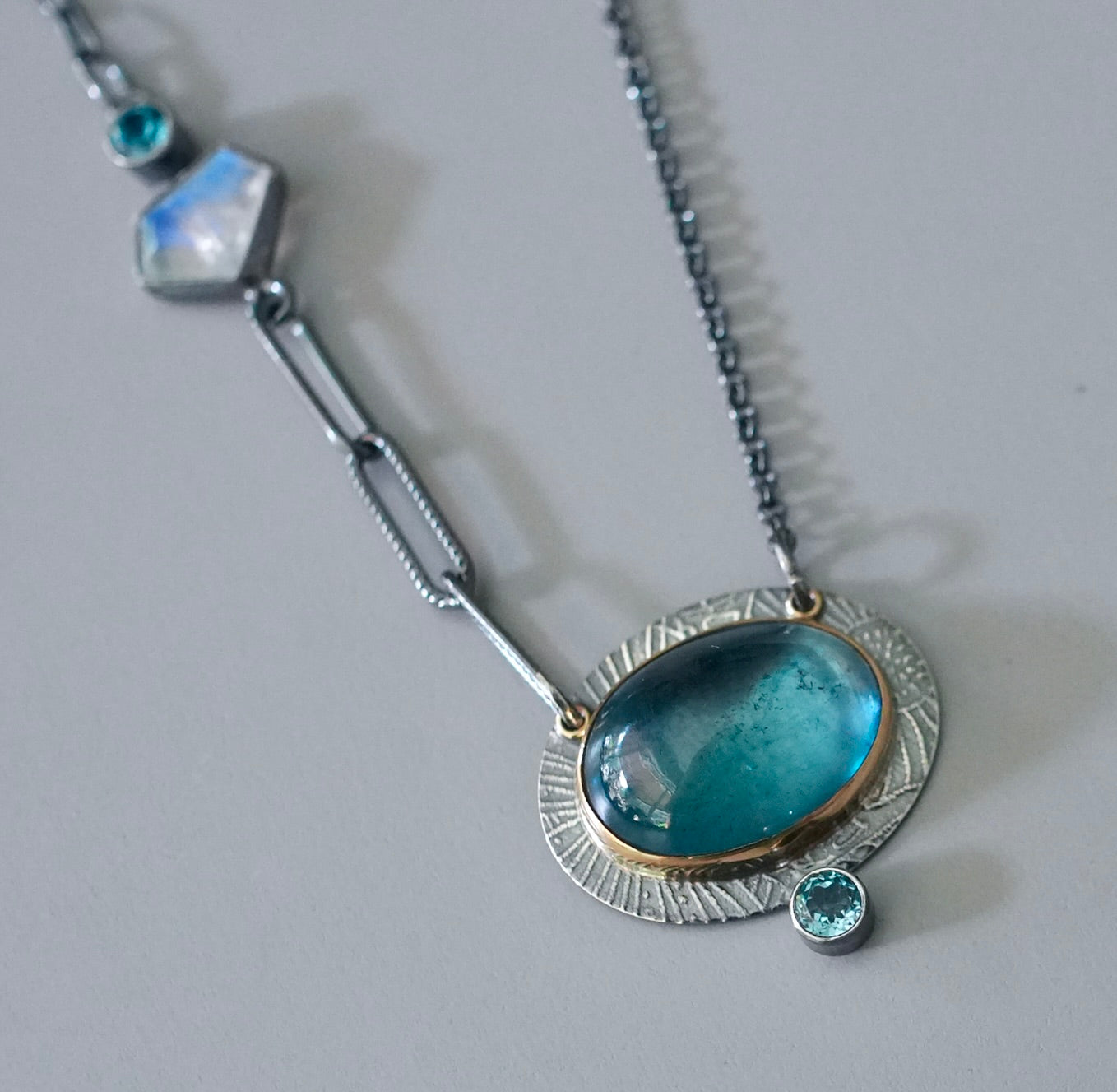 Aquamarine, blue topaz and rainbow moonstone necklace