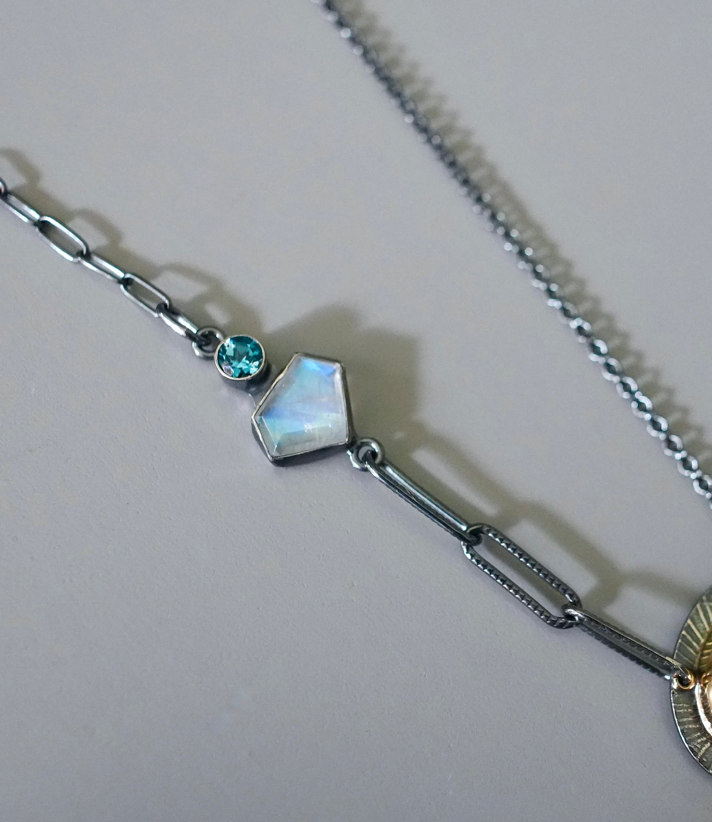 Aquamarine, blue topaz and rainbow moonstone necklace