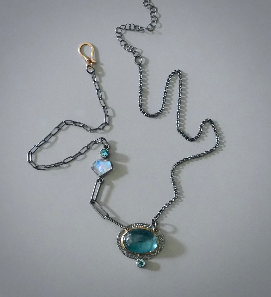 Aquamarine, blue topaz and rainbow moonstone necklace