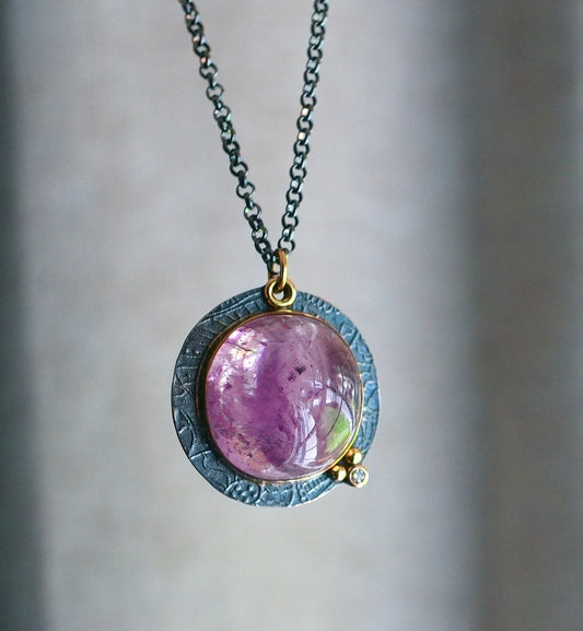 Kunzite and diamond pendant
