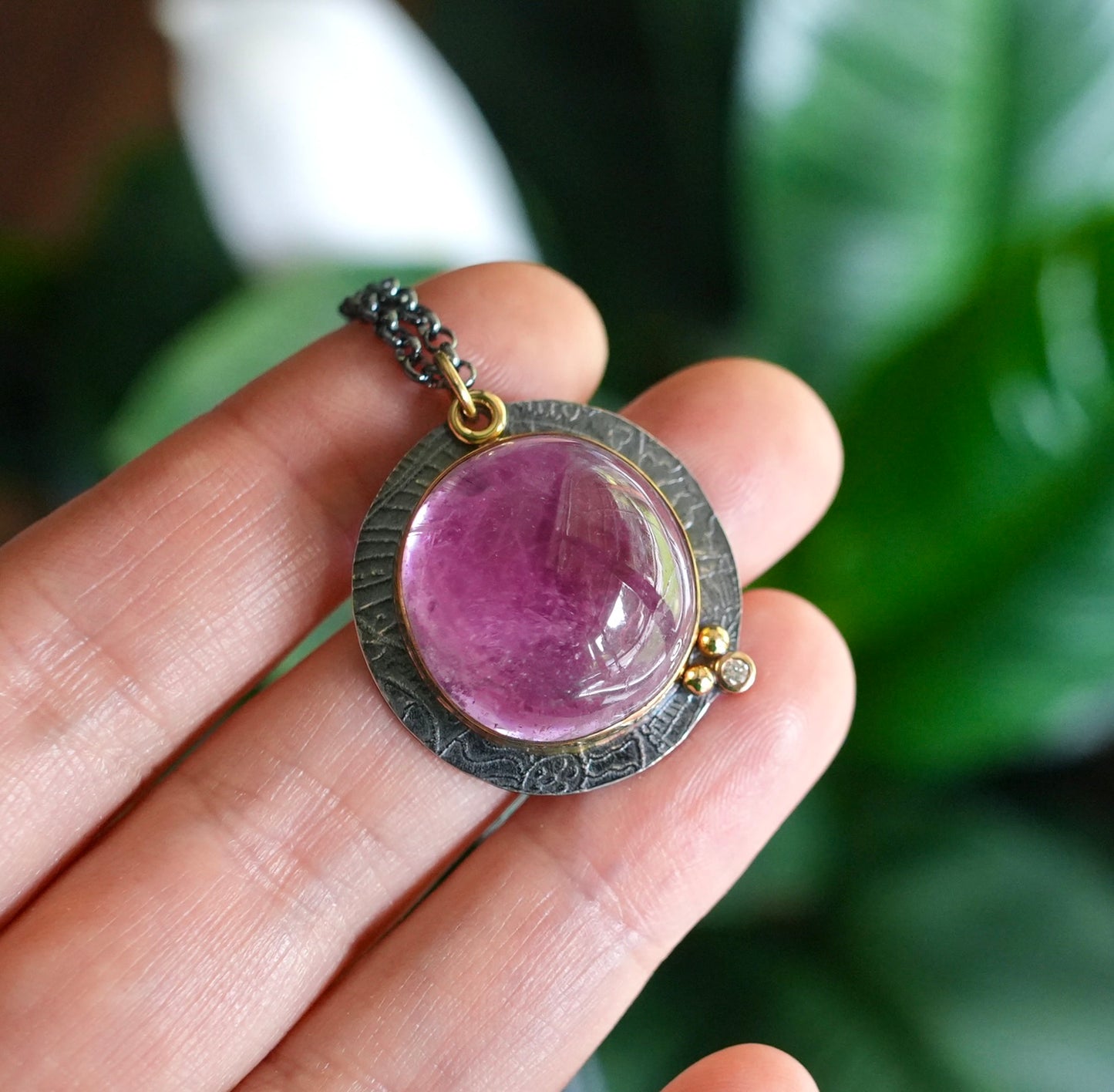 Kunzite and diamond pendant