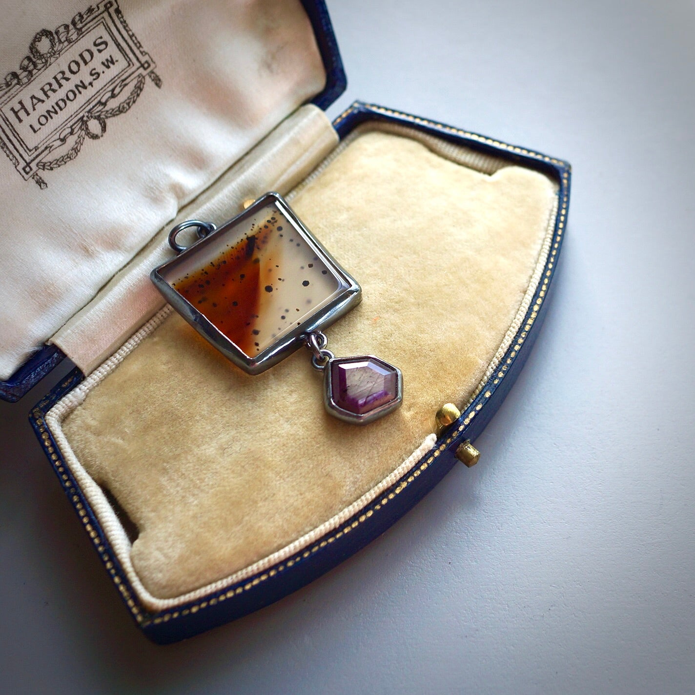 Montana agate and purple sapphire pendant -