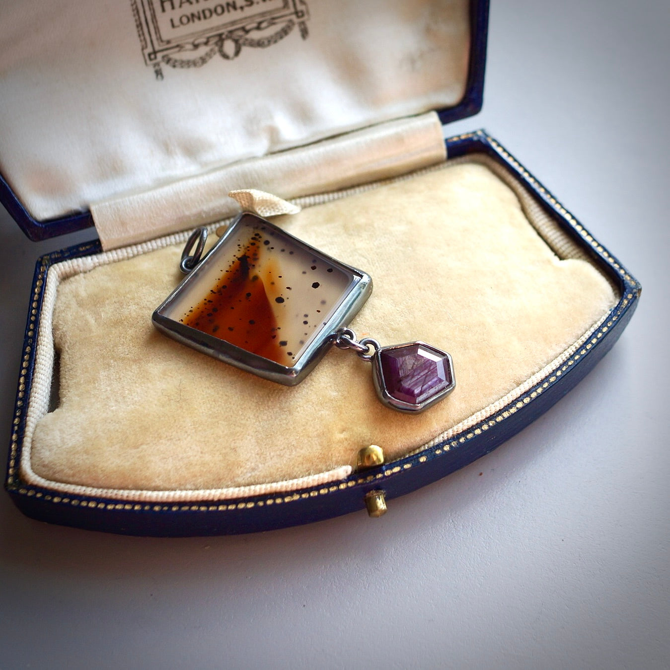 Montana agate and purple sapphire pendant -