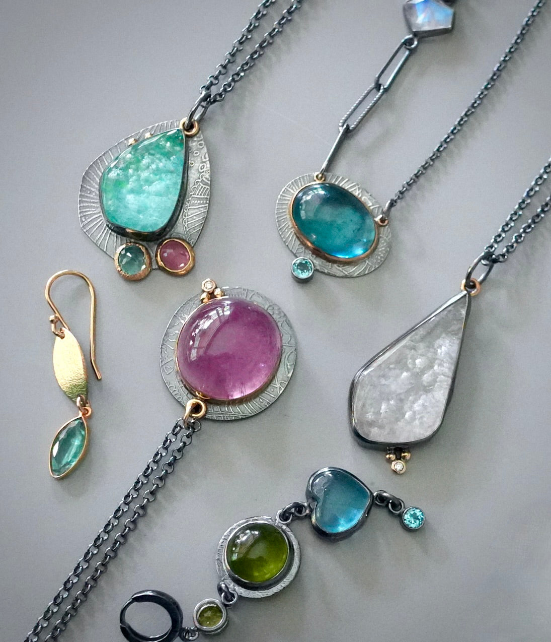Kunzite and diamond pendant