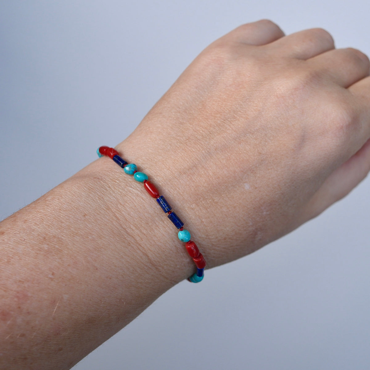 Lapis, turquoise and coral silk-knotted bracelet