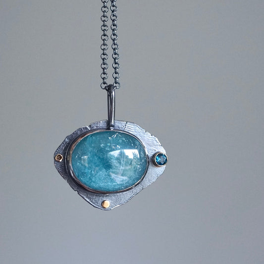 Raw blue tourmaline pendant