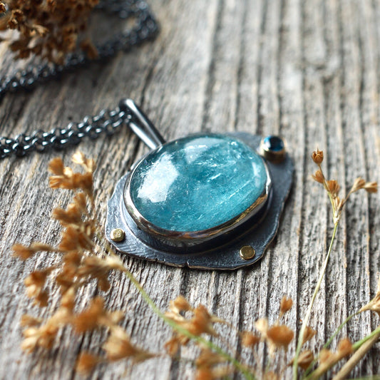 Raw blue tourmaline pendant