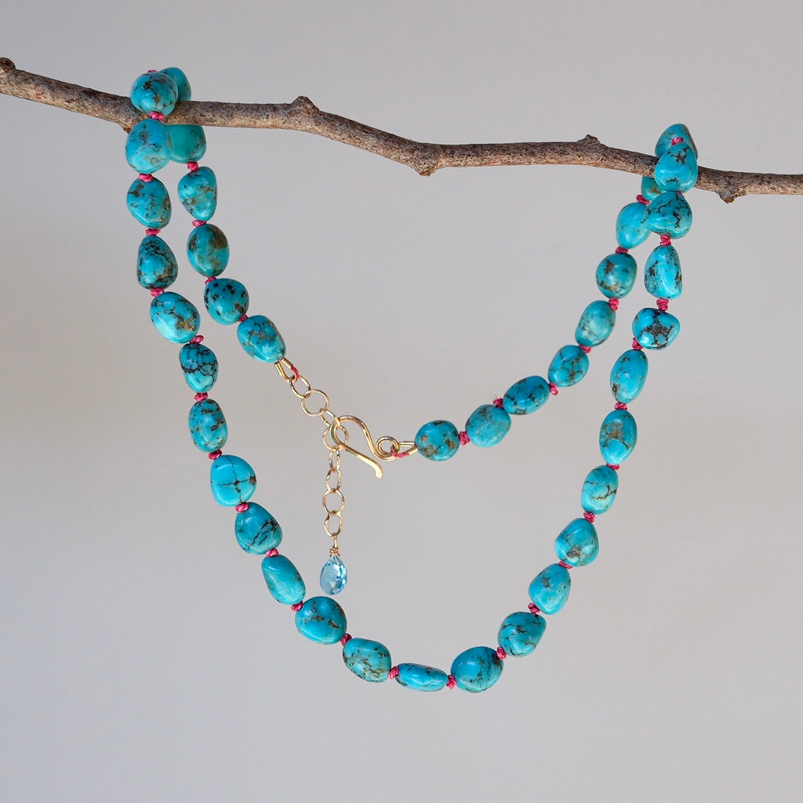 Nevada turquoise nugget necklace hand-knotted with coral silk