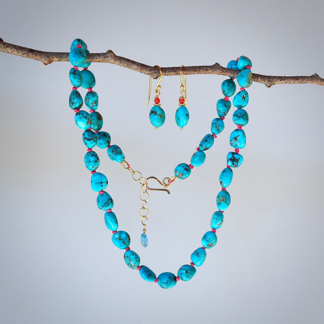 Nevada turquoise nugget earrings with red coral