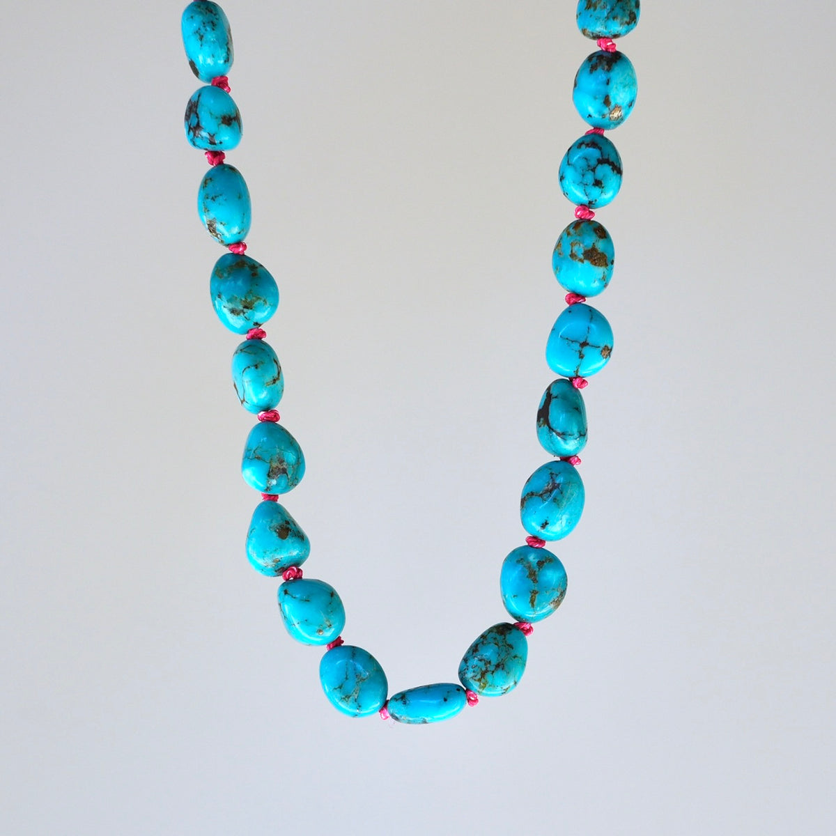 Nevada turquoise nugget necklace hand-knotted with coral silk