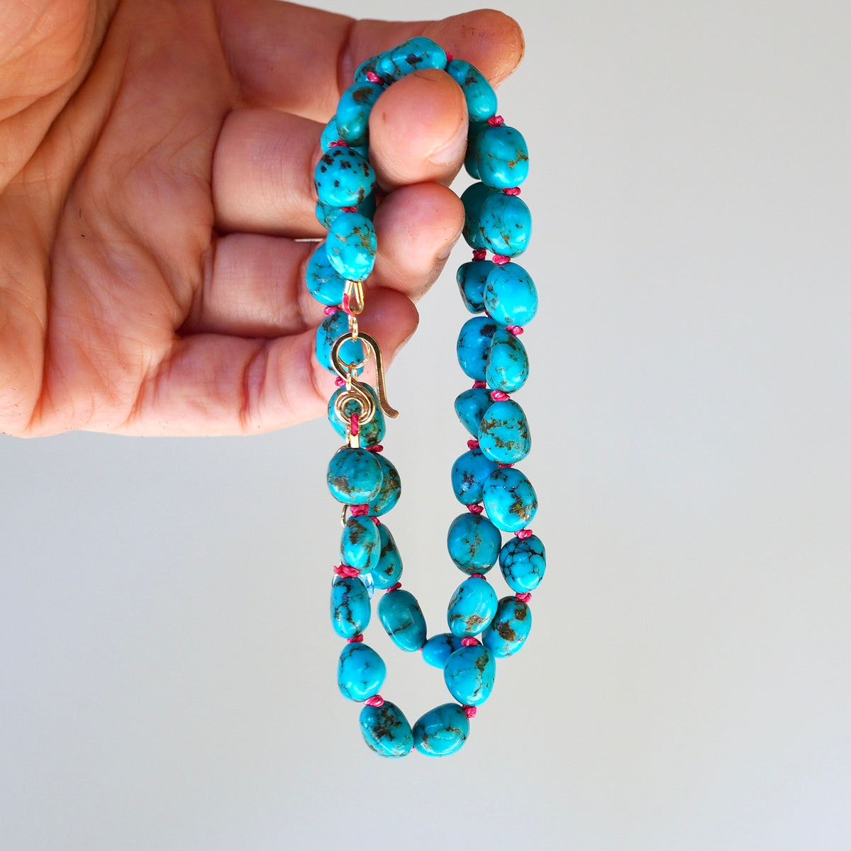 Nevada turquoise nugget necklace hand-knotted with coral silk