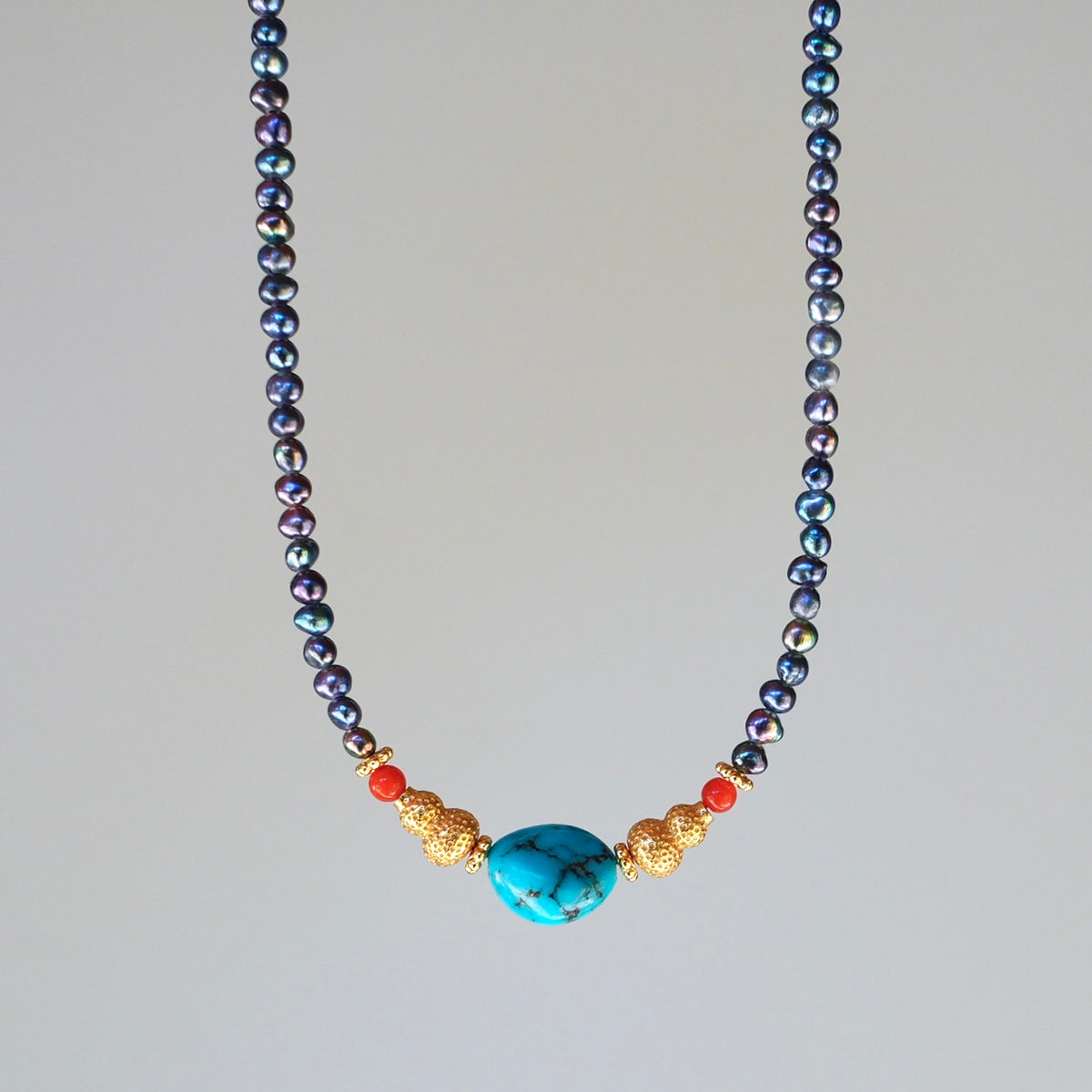 Peacock pearls, turquoise and coral necklace
