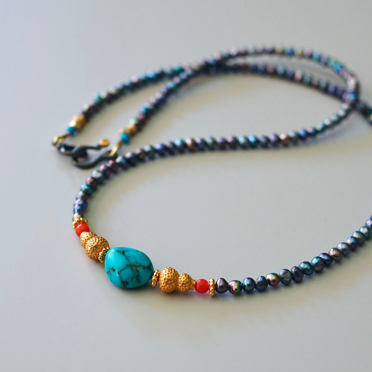 Peacock pearls, turquoise and coral necklace