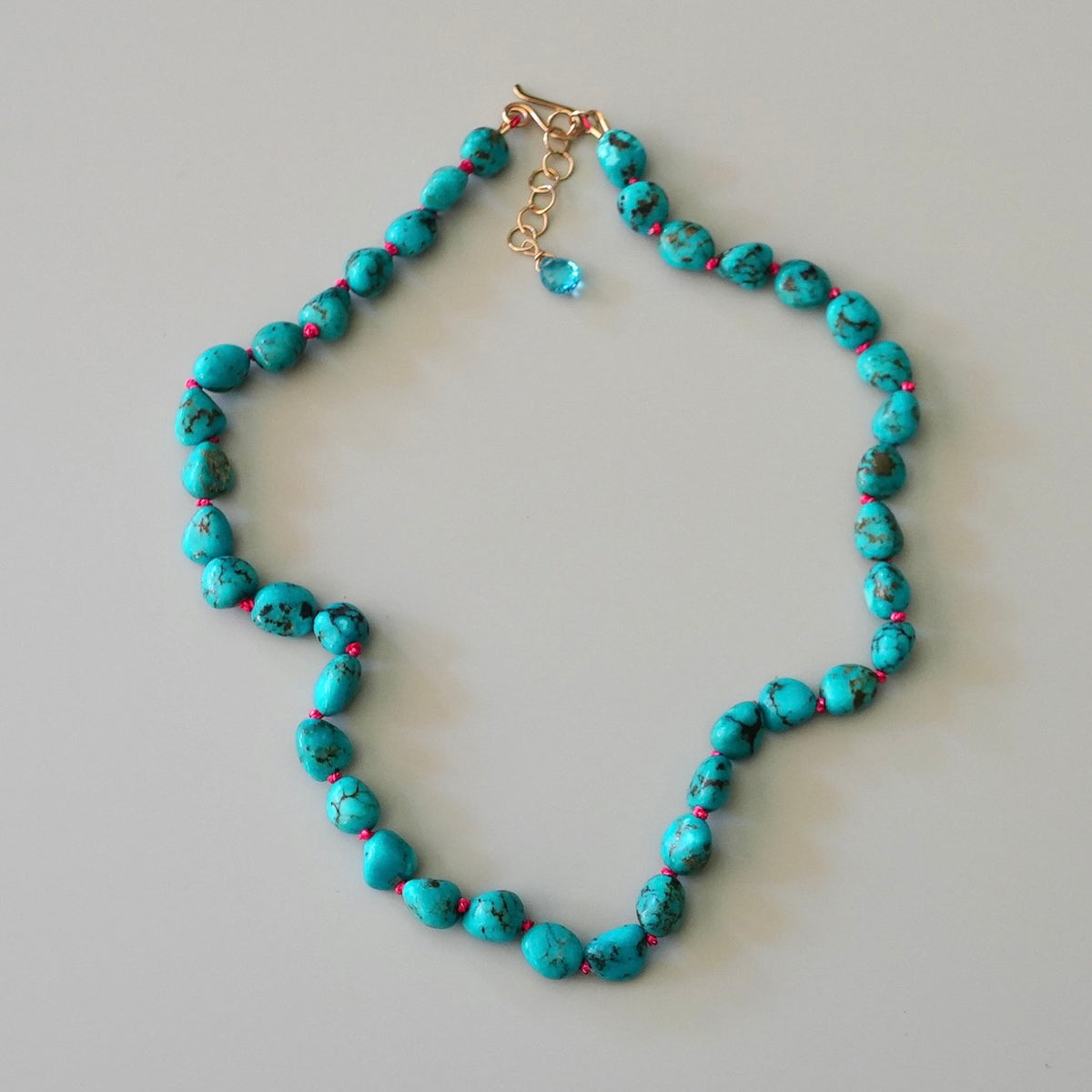 Nevada turquoise nugget necklace hand-knotted with coral silk