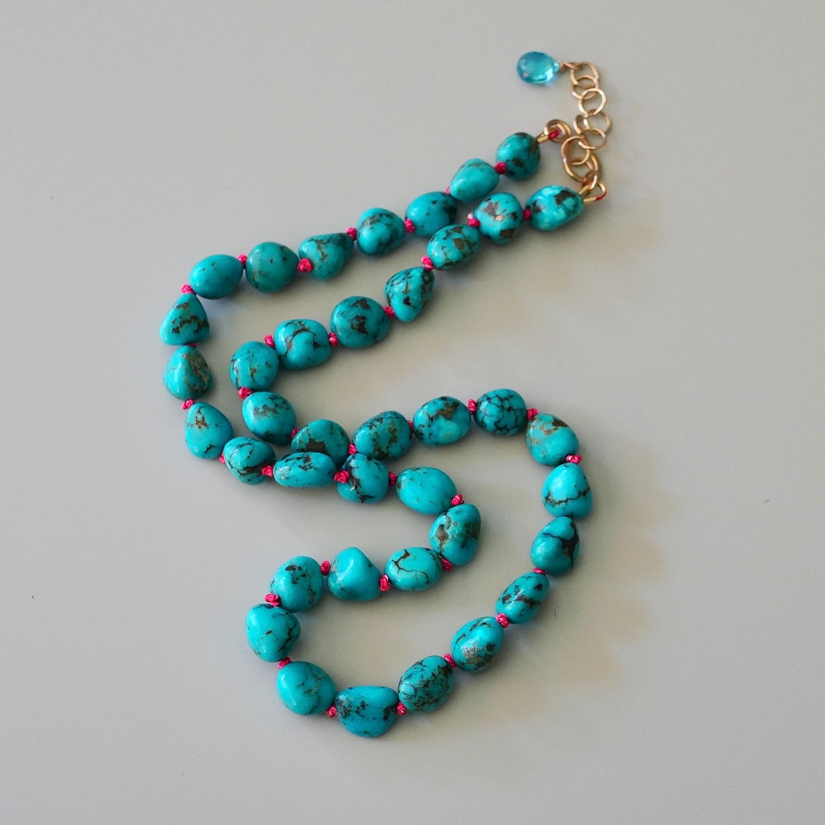 Nevada turquoise nugget necklace hand-knotted with coral silk