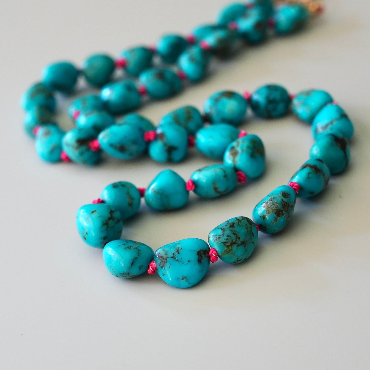 Nevada turquoise nugget necklace hand-knotted with coral silk