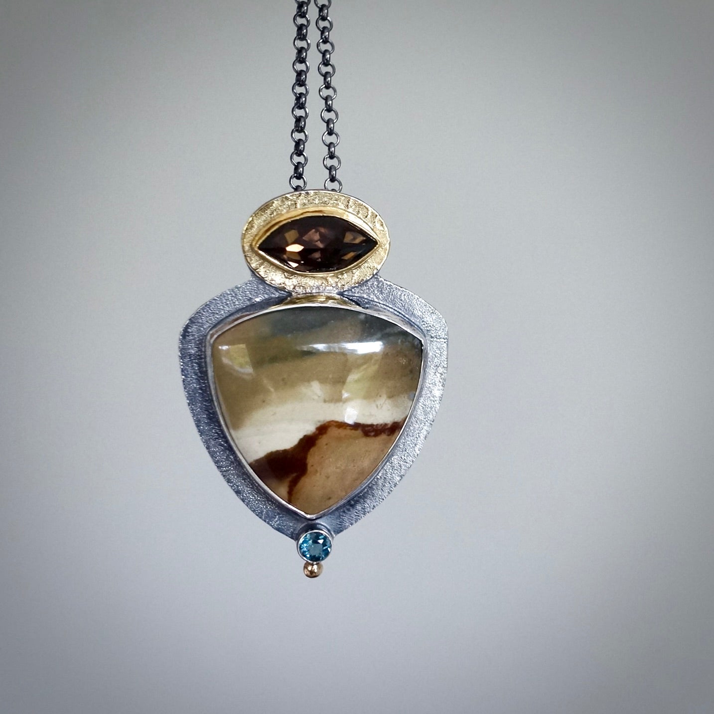 Landscape jasper, smokey quartz and London blue topaz pendant
