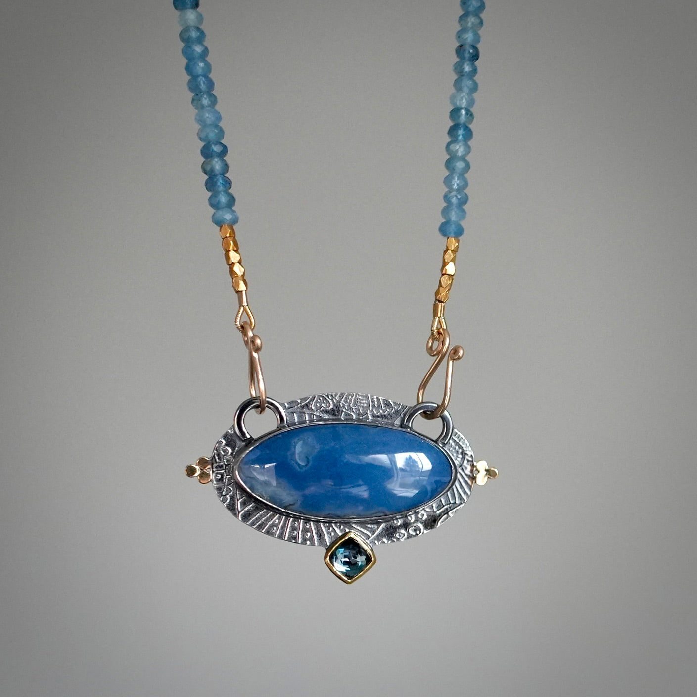 Blue opal and London blue topaz centerpiece