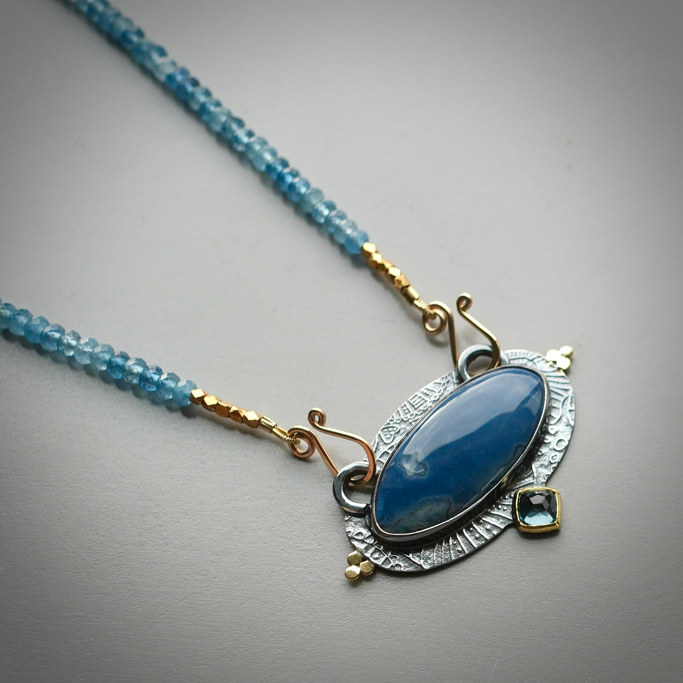 Blue opal and London blue topaz centerpiece