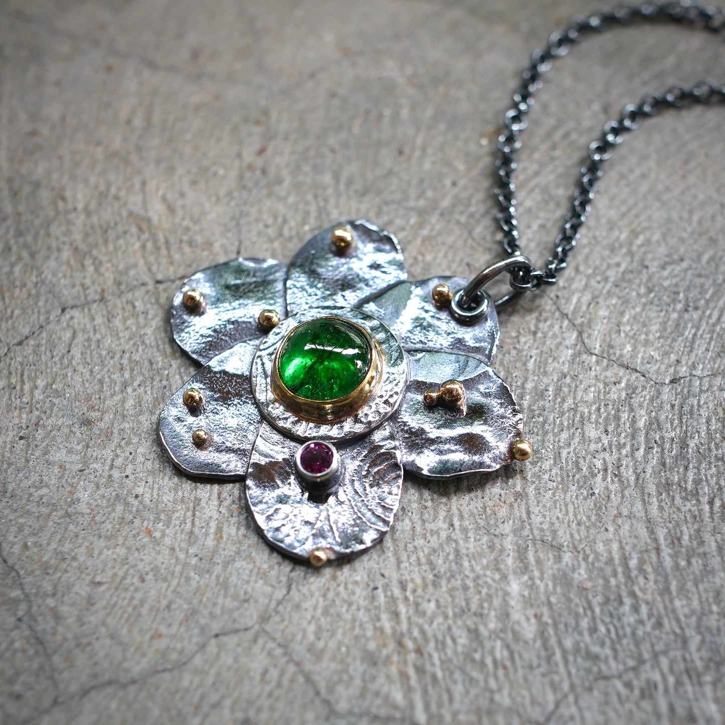 Tsavorite garnet flower pendant
