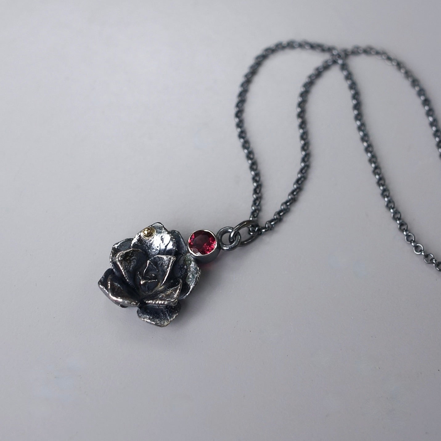 Rhodolite garnet and silver succulent pendant
